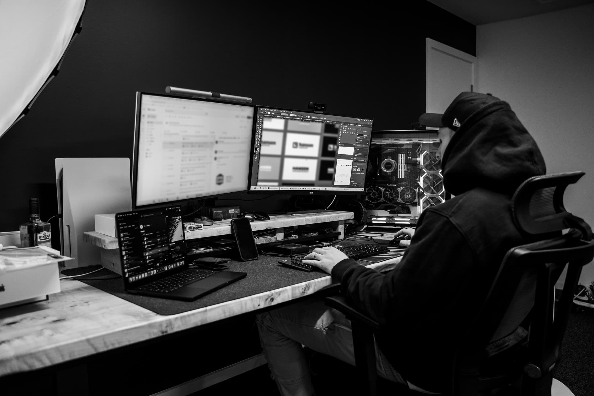 Jesse Creedon, graphic & web designer, at his desk in Devonport Tasmania