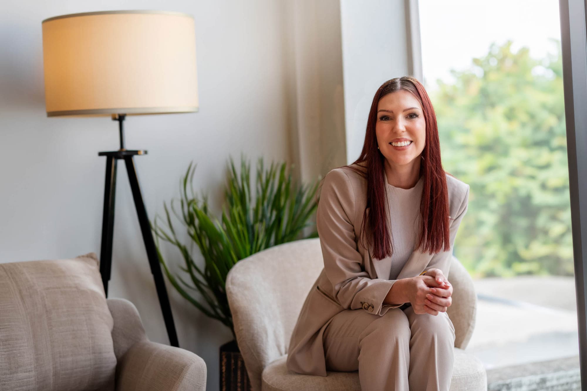Portrait of Alyshia Ruckert, Roberts Real Estate Shearwater, by Brand in Black