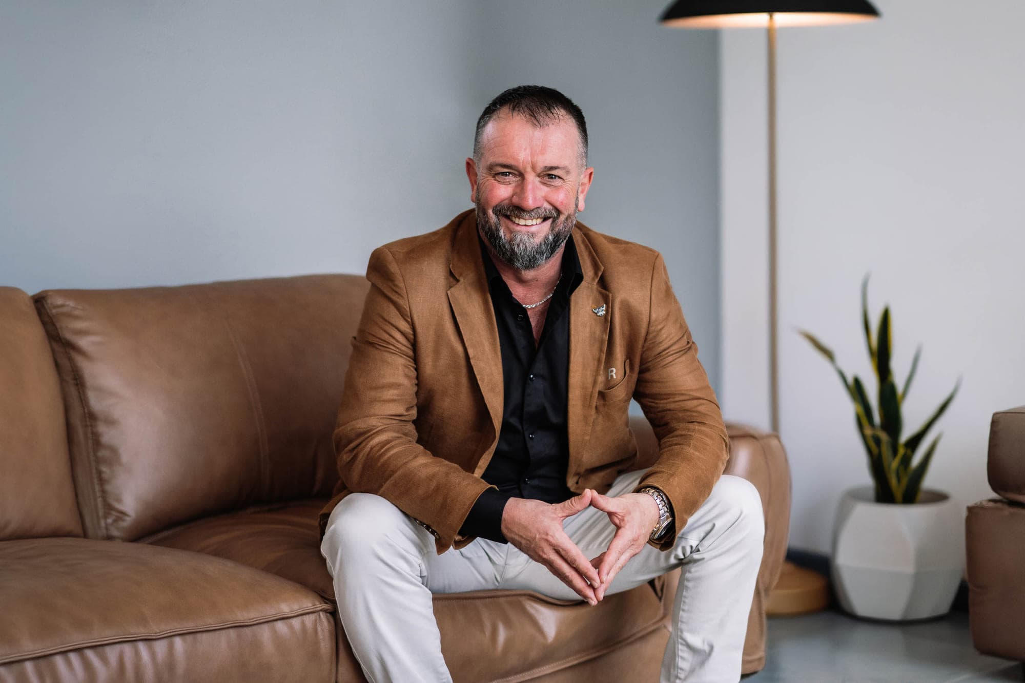 Portrait of Khan Dick, Roberts Real Estate Launceston, by Brand in Black
